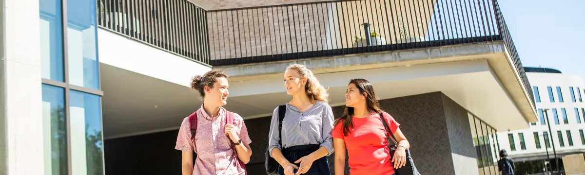 Three people walking